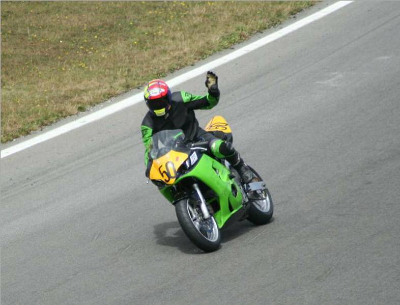 A wave to everyone at the end of a race A wave to everyone at the end of a race