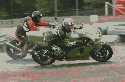 Shot taken at the ESS on Brands Hatch Indy circuit 2005.  The ZX7R stuffs it up the inside of an instructor in the pouring rain.